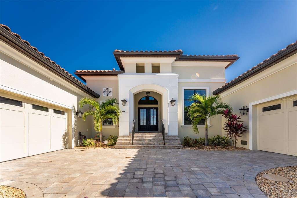 265 Severin Road Southeast Port Charlotte, FL 33952 - Photo 2 of 88 a front view of a house with garden