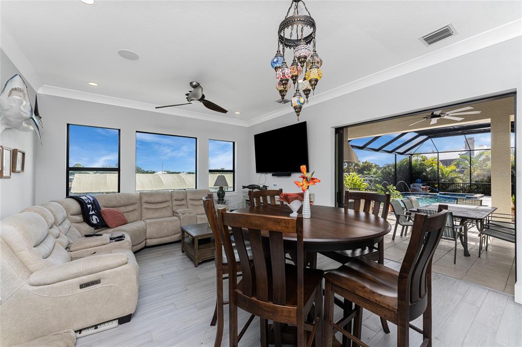 265 Severin Road Southeast Port Charlotte, FL 33952 - Photo 26 of 88 a view of a dining room with furniture window and outside view