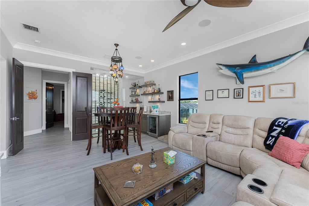 265 Severin Road Southeast Port Charlotte, FL 33952 - Photo 27 of 88 a living room with furniture and view of kitchen