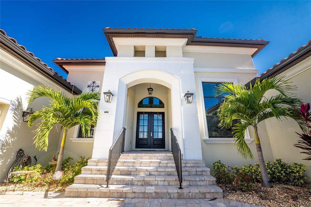 265 Severin Road Southeast Port Charlotte, FL 33952 - Photo 3 of 88 a front view of a house with garden