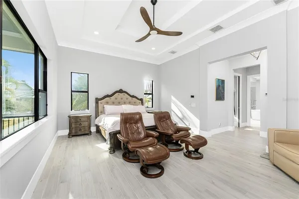 a view of a patio with a dining table and chairs