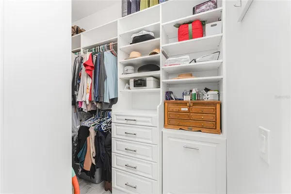 a view of a backyard with sitting area
