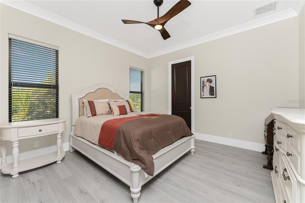265 Severin Road Southeast Port Charlotte, FL 33952 - Photo 50 of 88 a bed room with a bed and a window