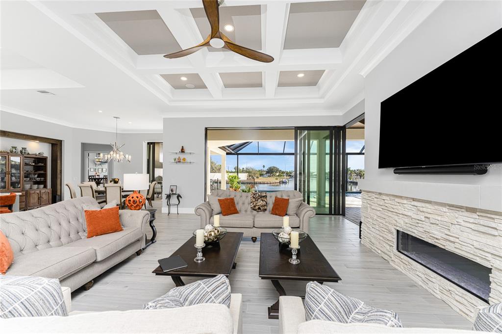 265 Severin Road Southeast Port Charlotte, FL 33952 - Photo 9 of 88 a living room with furniture and a flat screen tv