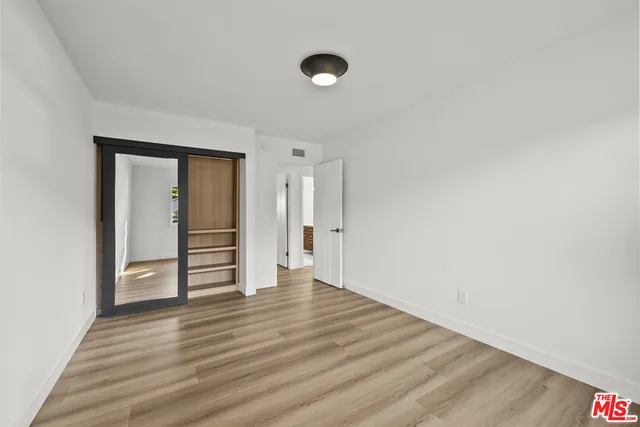 a view of a swimming pool with a yard