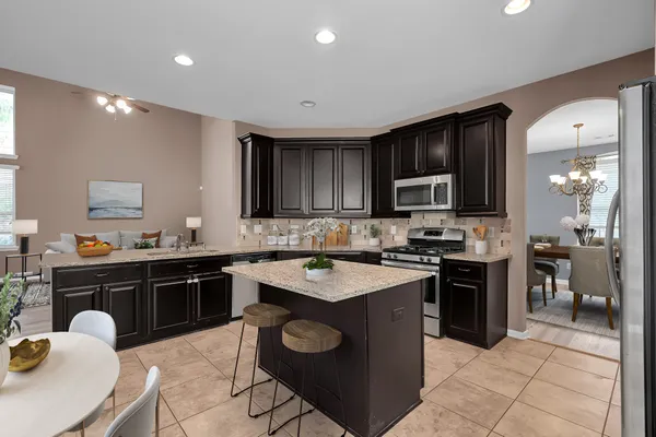 a kitchen with a sink and cabinets