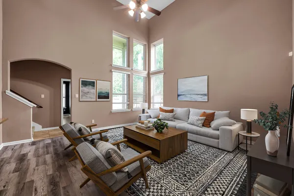 a living room with furniture and a window