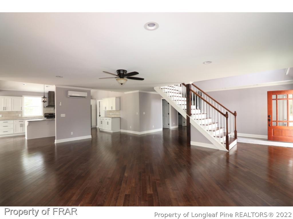 873 Morrison Bridge Road Vass, NC 28394 - Photo 5 of 35 a view of an entryway with wooden floor