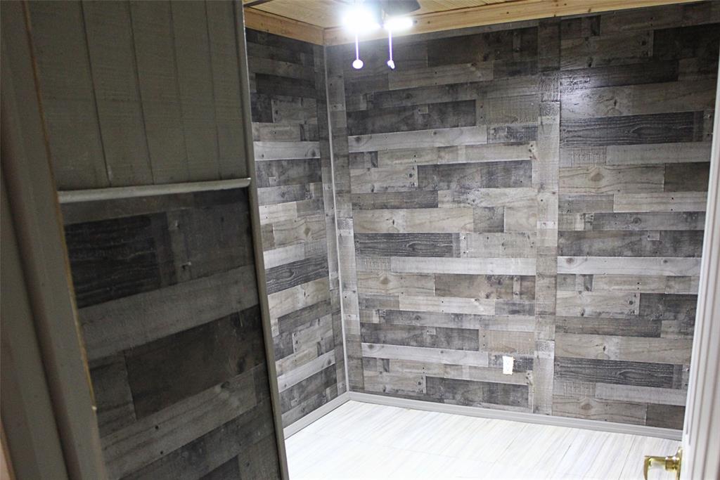 12608 Valverde Loop Terrell, TX 75161 - Photo 18 of 30 a bathroom with a shower