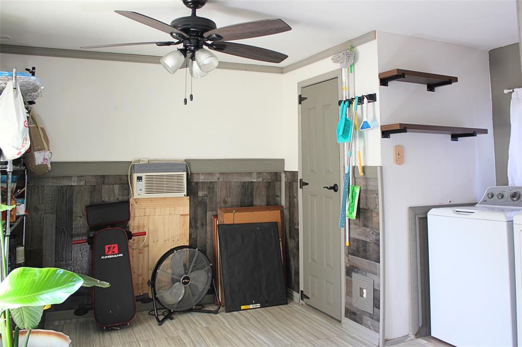 12608 Valverde Loop Terrell, TX 75161 - Photo 20 of 30 a utility room with dryer and washer