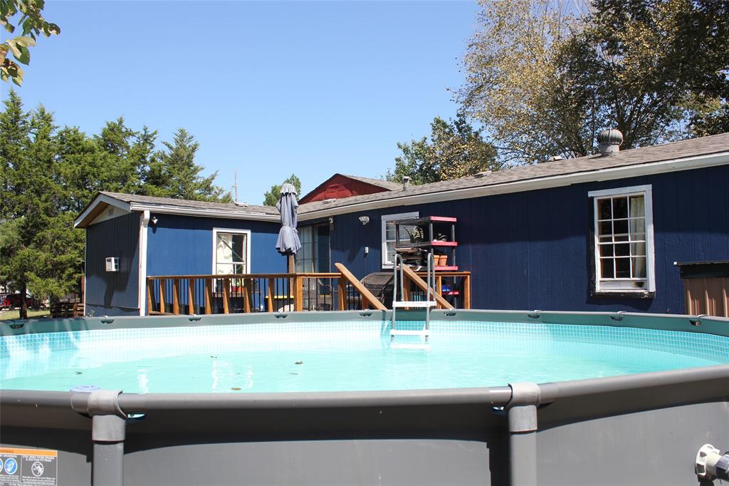 12608 Valverde Loop Terrell, TX 75161 - Photo 21 of 30 a view of a house with backyard