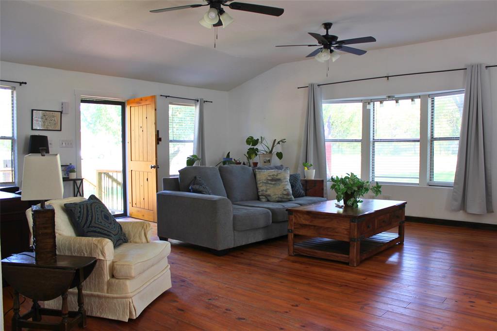 12608 Valverde Loop Terrell, TX 75161 - Photo 6 of 30 a living room with furniture and a large window