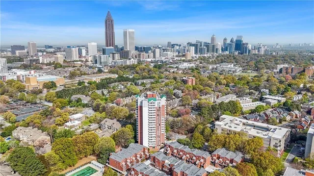 a view of a city with tall buildings