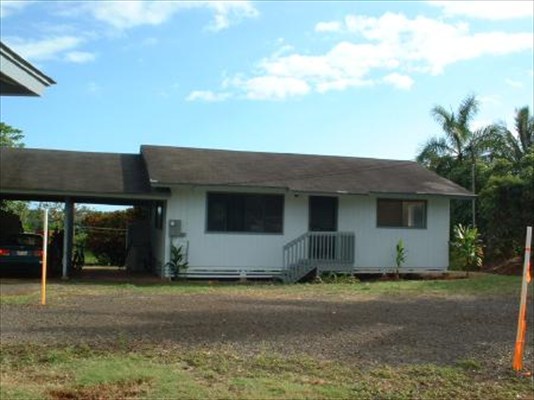 4855 A Nonou Road, Unit 4 Kapaa, HI 96746 - Photo 2 of 3 a house view with a garden