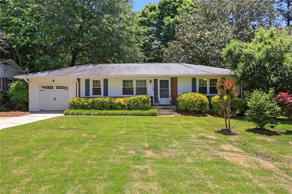 2535 Harrington Drive Decatur, GA 30033 - Photo 1 of 1 a house view with a garden space