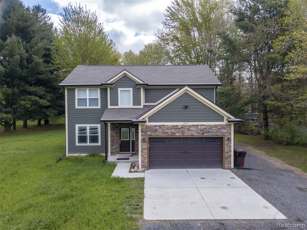 11913 Tuttle Hill Road Willis, MI 48191 - Photo 1 of 32