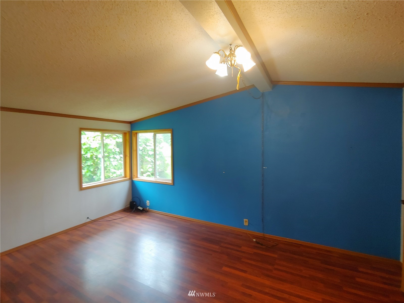 383 Bunker Creek Road Chehalis, WA 98532 - Photo 21 of 35 a view of empty room with wooden floor and fan