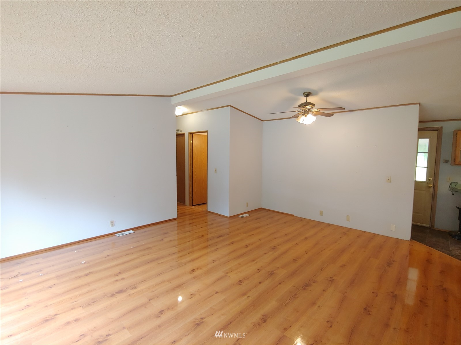 383 Bunker Creek Road Chehalis, WA 98532 - Photo 7 of 35 a view of empty room with wooden floor