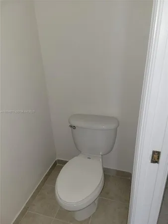 a bathroom with a toilet