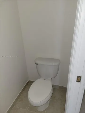 a bathroom with a toilet