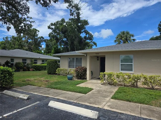 front view of a house and a yard