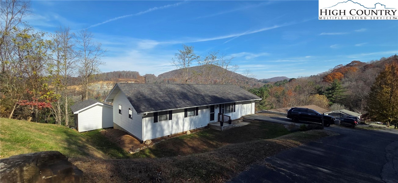 516 White Laurel Lane Boone, NC 28607 - Photo 2 of 27 a view of houses with a yard