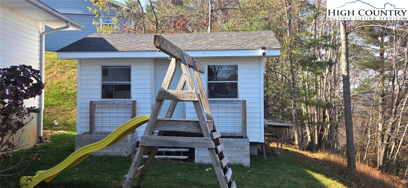 516 White Laurel Lane Boone, NC 28607 - Photo 9 of 27 a front view of a house with a yard