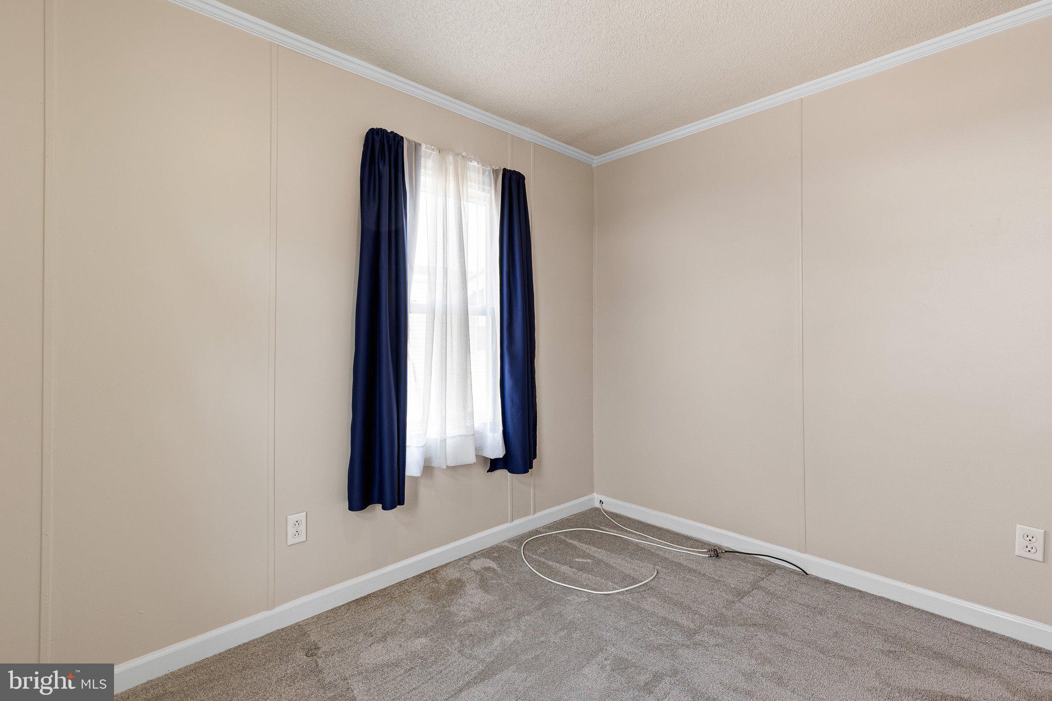 1004 Sulky Road, Unit 225 Wilmington, DE 19810 - Photo 16 of 21 an empty room with windows