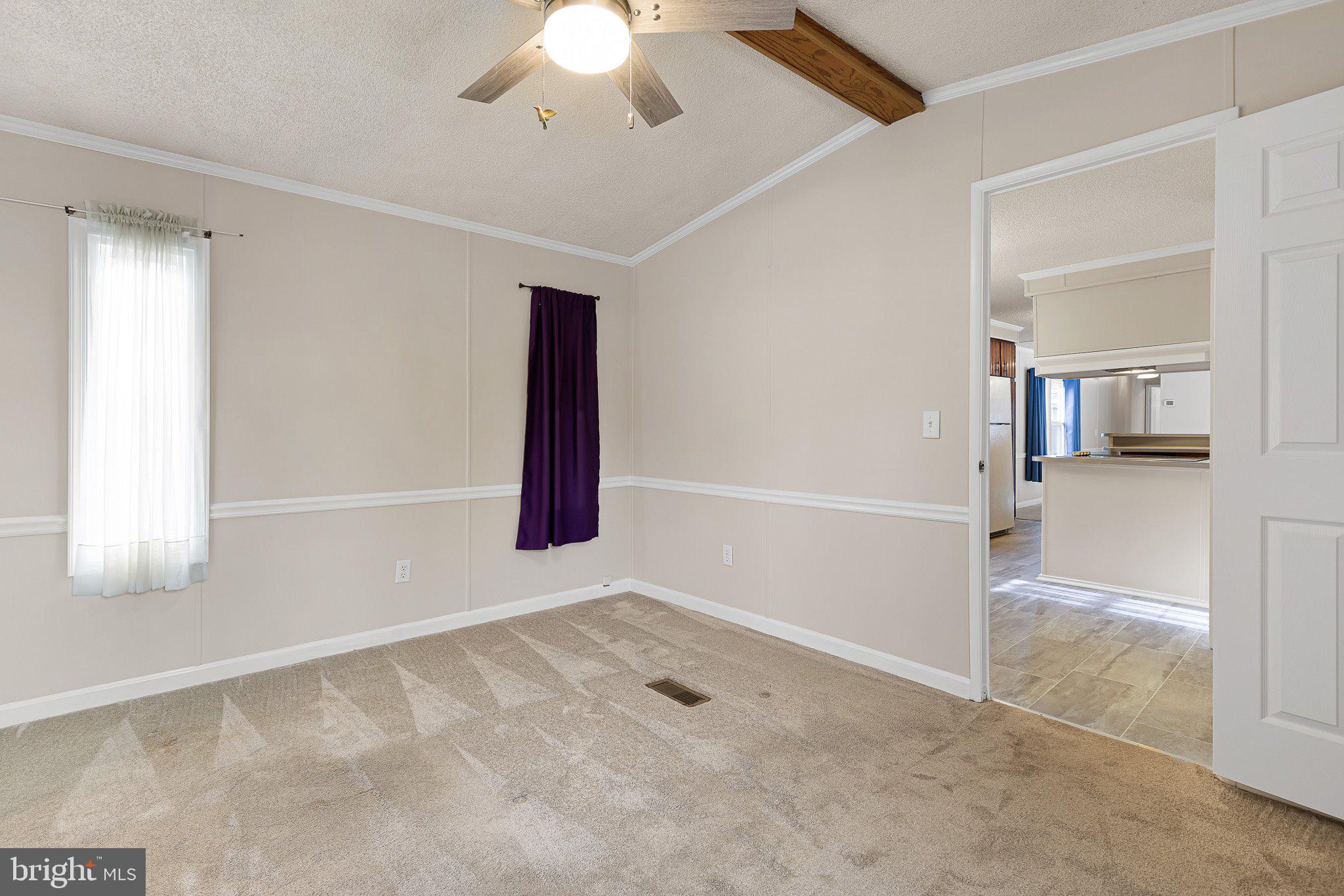 1004 Sulky Road, Unit 225 Wilmington, DE 19810 - Photo 18 of 21 an empty room with windows and cabinet
