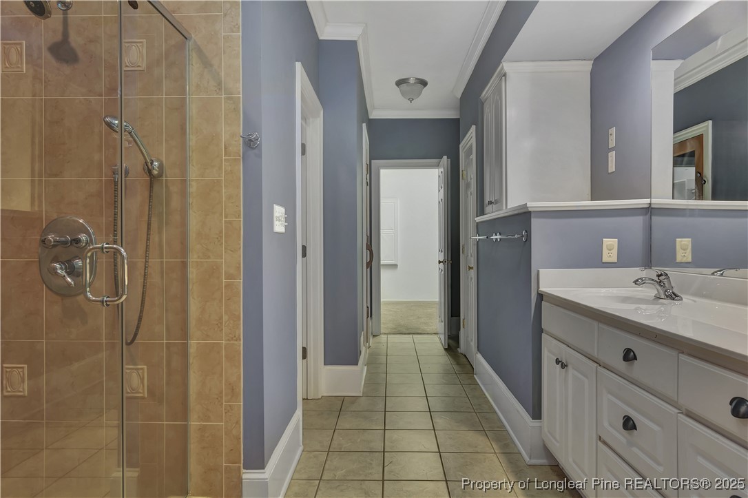 389 Brookgreen Drive Lumberton, NC 28358 - Photo 19 of 44 a bathroom with a granite countertop shower a sink and a mirror