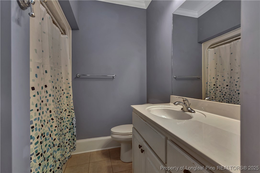 389 Brookgreen Drive Lumberton, NC 28358 - Photo 32 of 44 a bathroom with a sink toilet and shower