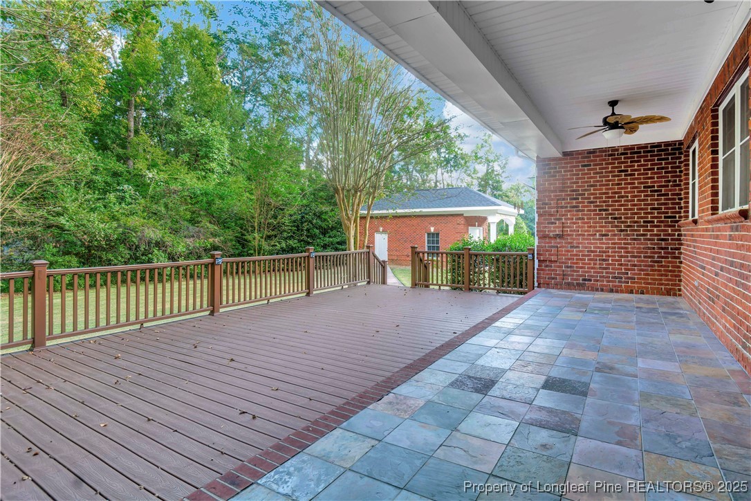 389 Brookgreen Drive Lumberton, NC 28358 - Photo 41 of 44 a view of a house with a wooden deck