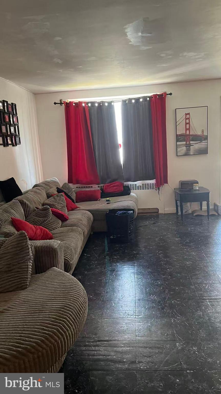 3116 Cottman Avenue Philadelphia, PA 19149 - Photo 5 of 10 a living room with furniture and a couch