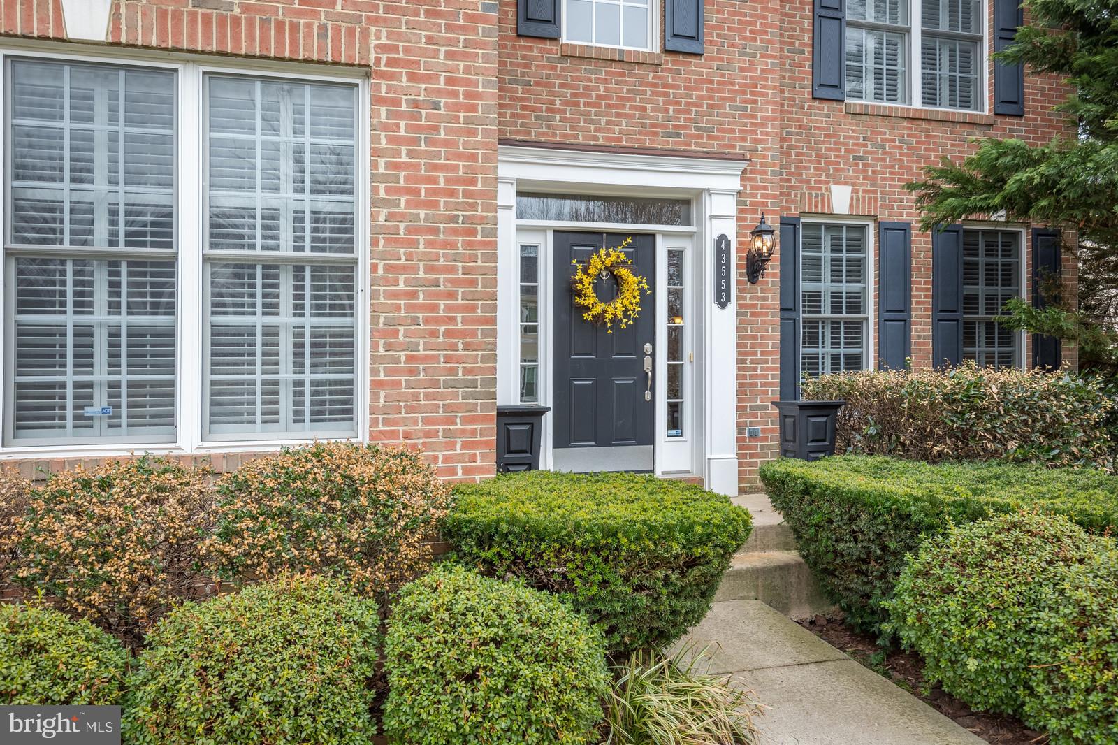 43553 Dempsey Lane Chantilly, VA 20152 - Photo 2 of 30 a view of a house with potted plants