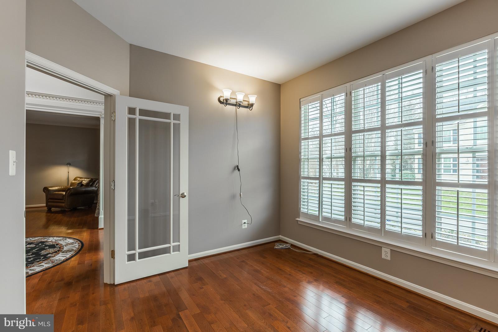 43553 Dempsey Lane Chantilly, VA 20152 - Photo 11 of 30 a view of a livingroom with wooden floor and furniture