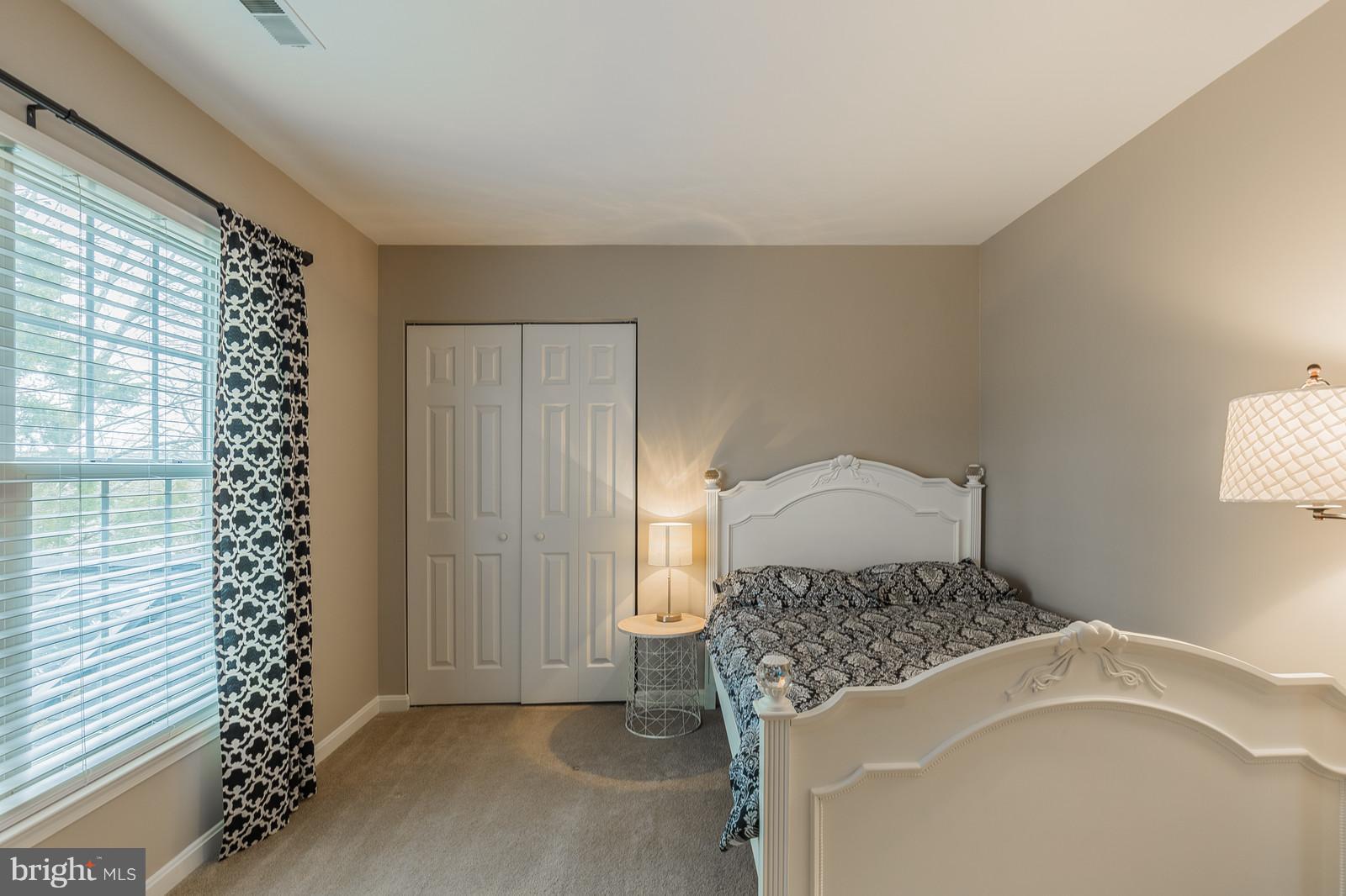 43553 Dempsey Lane Chantilly, VA 20152 - Photo 19 of 30 a bedroom with a bed and a window