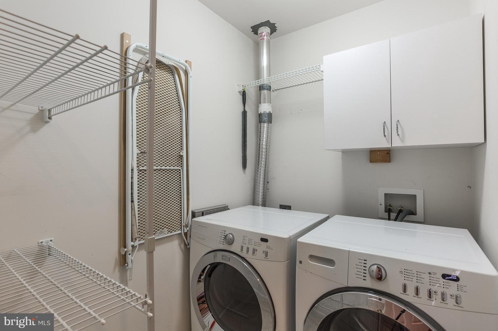 43553 Dempsey Lane Chantilly, VA 20152 - Photo 22 of 30 a view of storage and utility room with washer and dryer