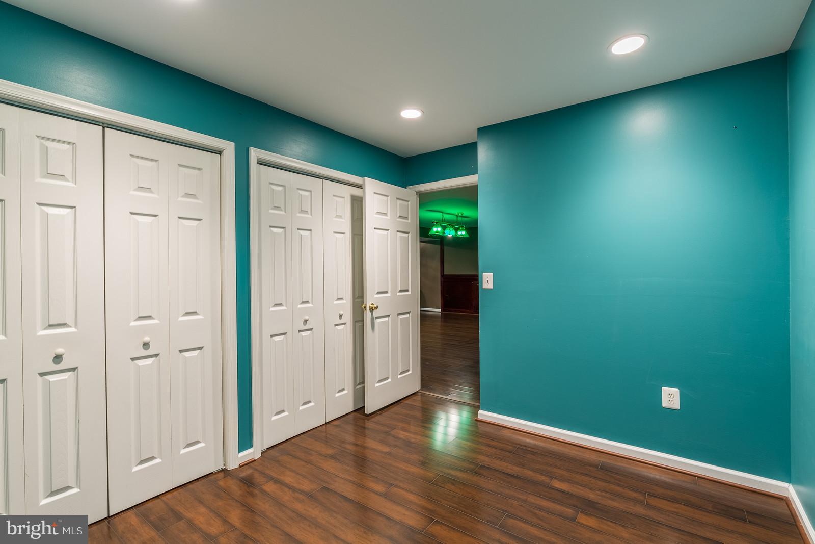 43553 Dempsey Lane Chantilly, VA 20152 - Photo 25 of 30 a view of empty room with wooden floor