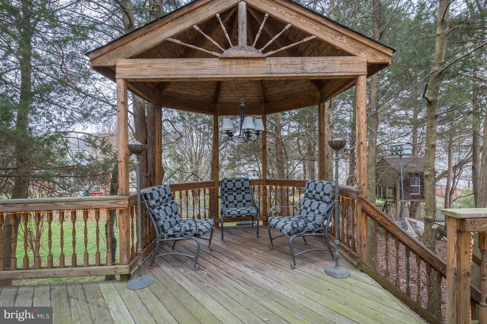 43553 Dempsey Lane Chantilly, VA 20152 - Photo 28 of 30 a roof deck with table and chairs