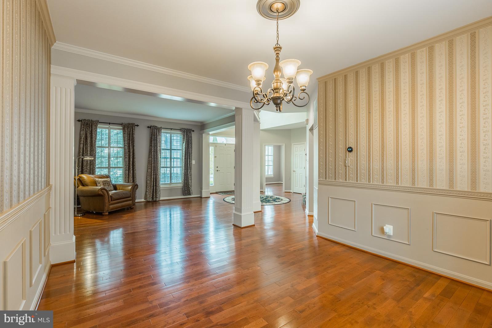 43553 Dempsey Lane Chantilly, VA 20152 - Photo 10 of 30 a view of a livingroom with a furniture wooden floor and windows
