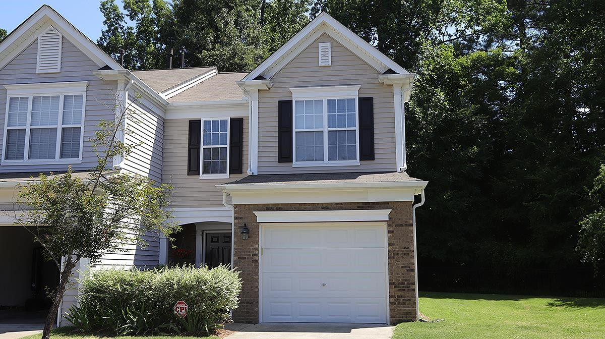 7020 Racine Way Raleigh, NC 27690 - Photo 1 of 26 Welcome to 7020 Racine Way. Fabulous end unit with tree lined back yard. Exterior Front