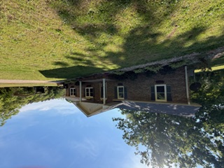 103 Gilkeson Road Honea Path, SC 29654 - Photo 21 of 25 This charming residence is set amidst a lush, verdant landscape, offering a serene outdoor environment.