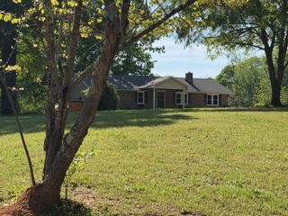 103 Gilkeson Road Honea Path, SC 29654 - Photo 23 of 25 This charming home sits on a spacious lot with a classic brick exterior.