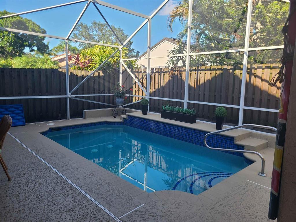Undisclosed Address Lake Worth, FL 33467 - Photo 18 of 21 a view of small pool and table in the patio
