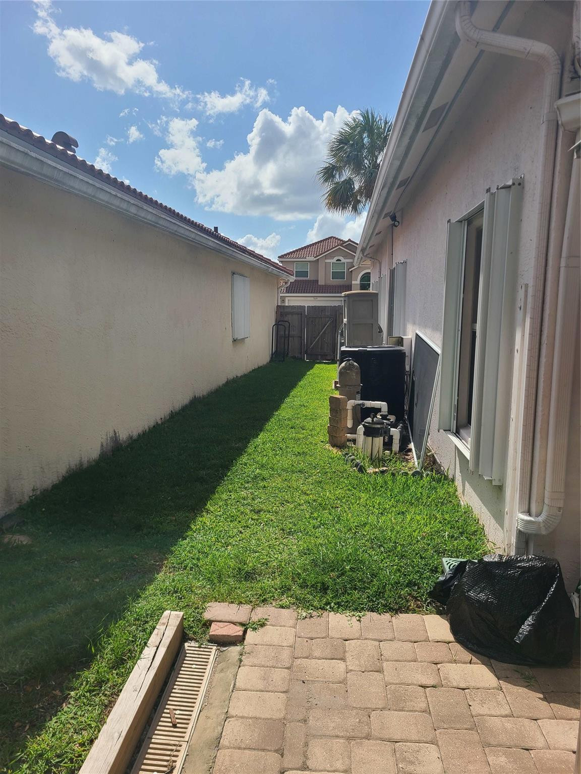 Undisclosed Address Lake Worth, FL 33467 - Photo 20 of 21 a view of a backyard with sitting area