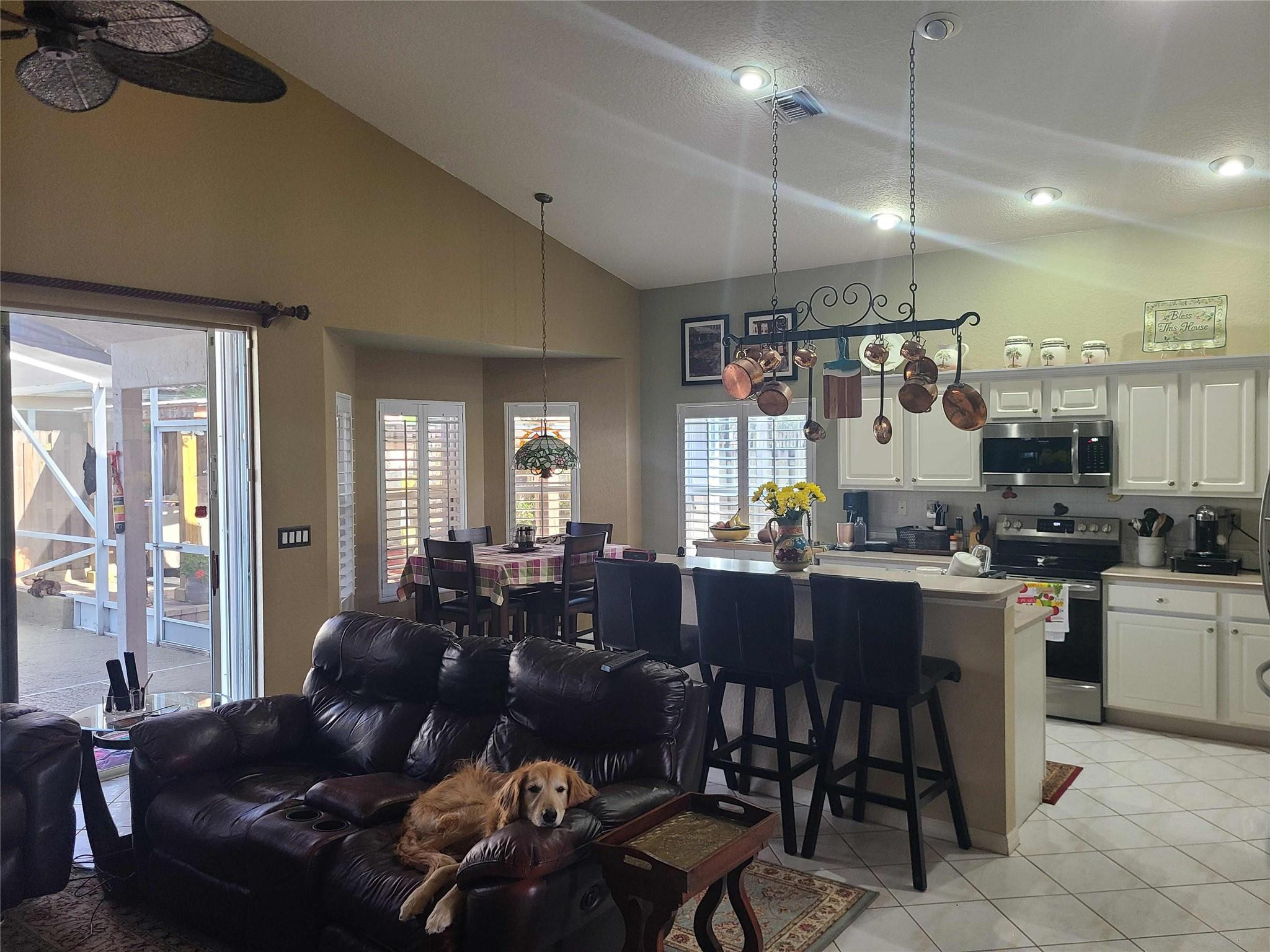 Undisclosed Address Lake Worth, FL 33467 - Photo 5 of 21 a living room with lots of furniture and kitchen view