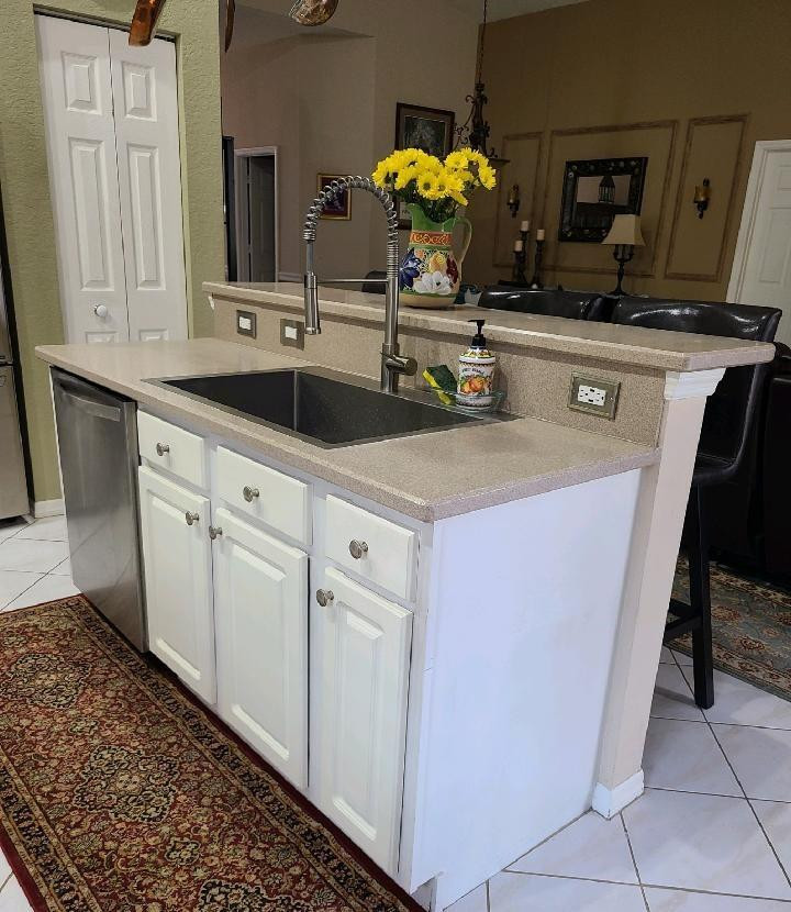 Undisclosed Address Lake Worth, FL 33467 - Photo 10 of 21 a kitchen with cabinets and window