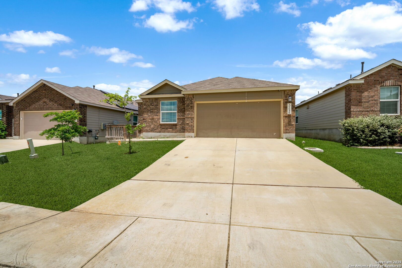 31646 Untrodden Way Bulverde, TX 78163 - Photo 2 of 36 a front view of a house with a yard