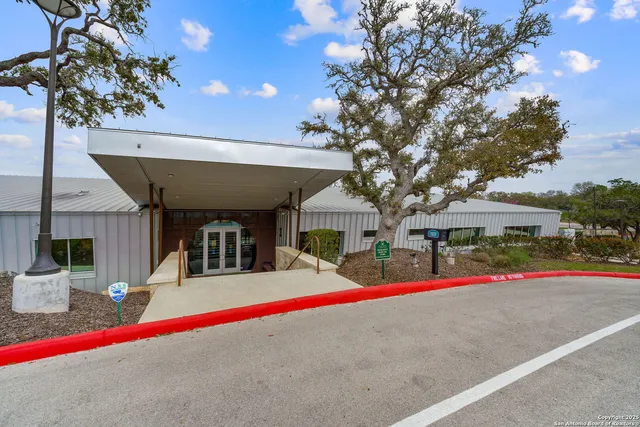 a view of a yard with swimming pool