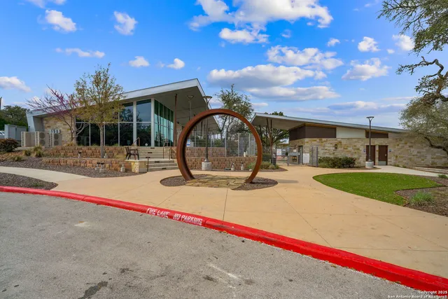 a view of a swimming pool with a lake view